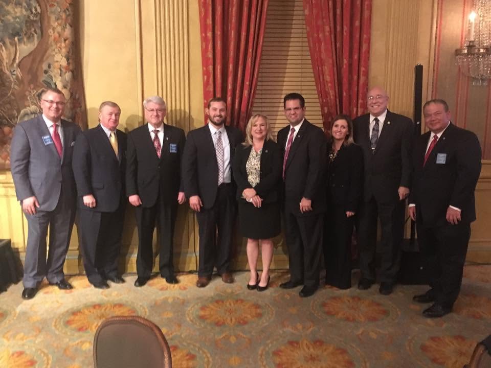 Chapter members seated together during a regional event